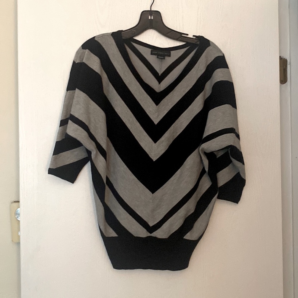 Joan Voss- Black and gray sweater